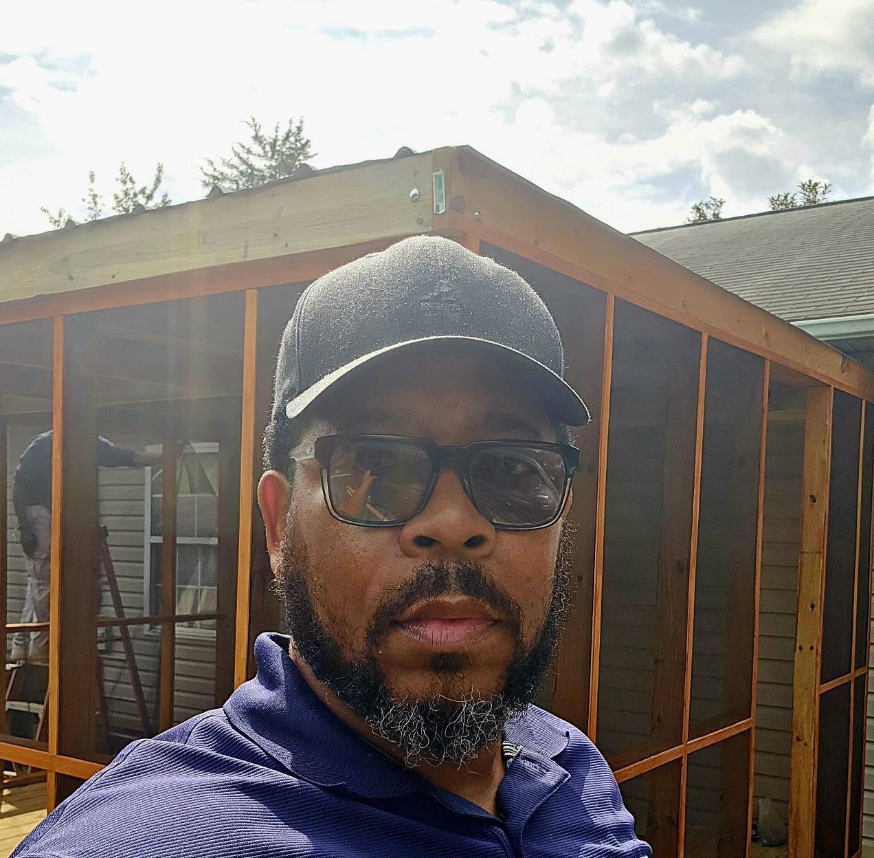 W.R. Crump on-site at the completed Owens family screened porch