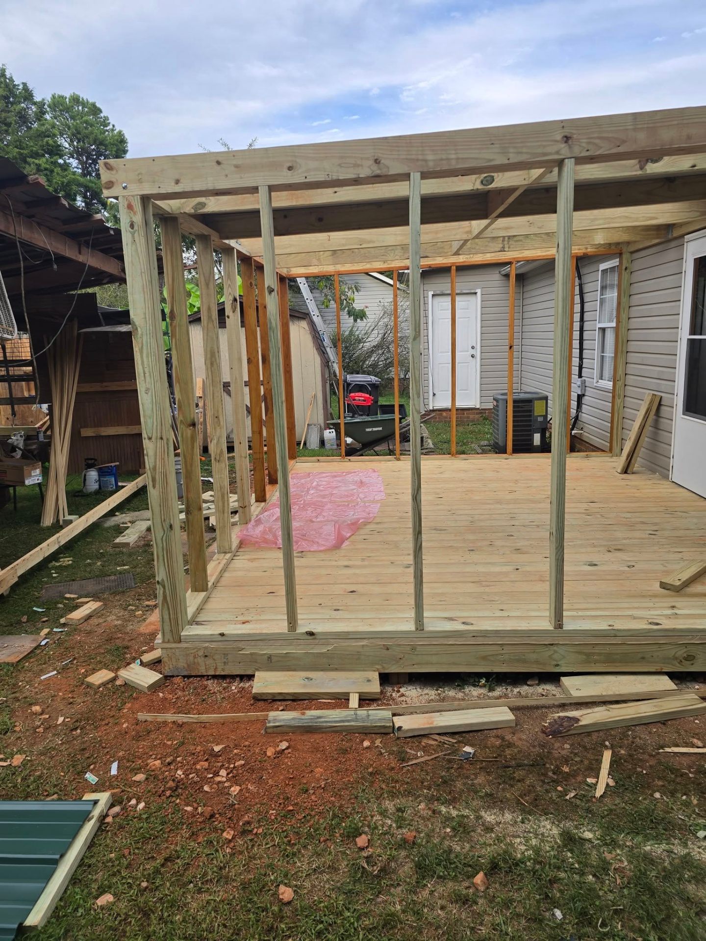 Vertical wall studs framed up on the new deck